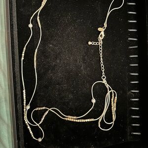 Chicos gold multi layer necklace
40 inches with a 4.5 inch extension